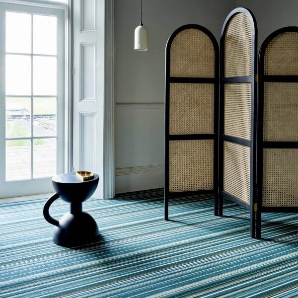 turquoise rug with japanese blinds